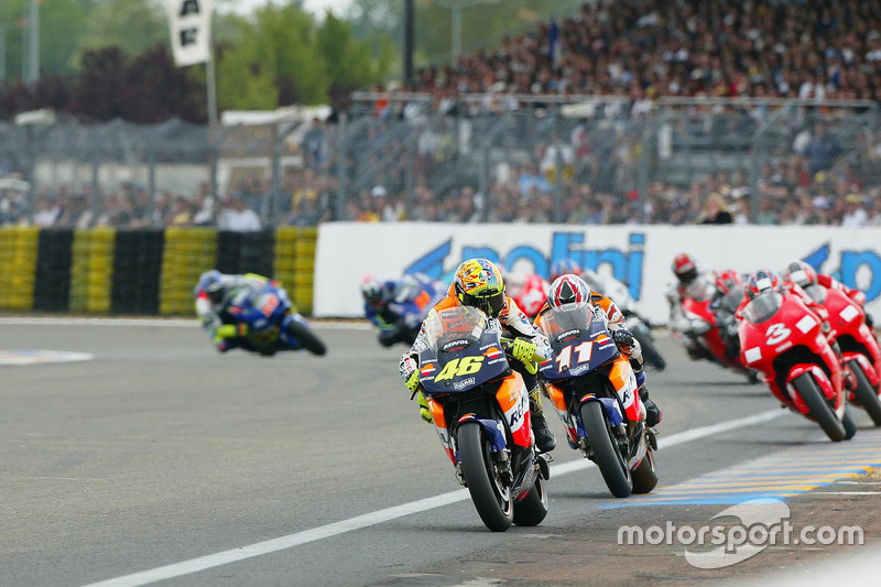 <img src="http://cdn-1.motorsport.com/static/custom/car-thumbs/MOTOGP_2017/RIDERS_NUMBERS/Rossi.png" width="55" /> #16 GP de France 2002