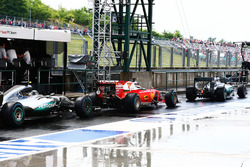 Lewis Hamilton, Mercedes AMG F1 W07 Hybrid leads Kimi Raikkonen, Ferrari SF16-H and Nico Rosberg, Me