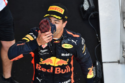 Race winner Daniel Ricciardo, Red Bull Racing celebrates on the podium with a shoey