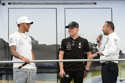 Lewis Hamilton, Mercedes-AMG F1 and Valtteri Bottas, Mercedes-AMG F1 on stage
