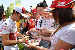 Charles Leclerc, Sauber signs autographs for the fans