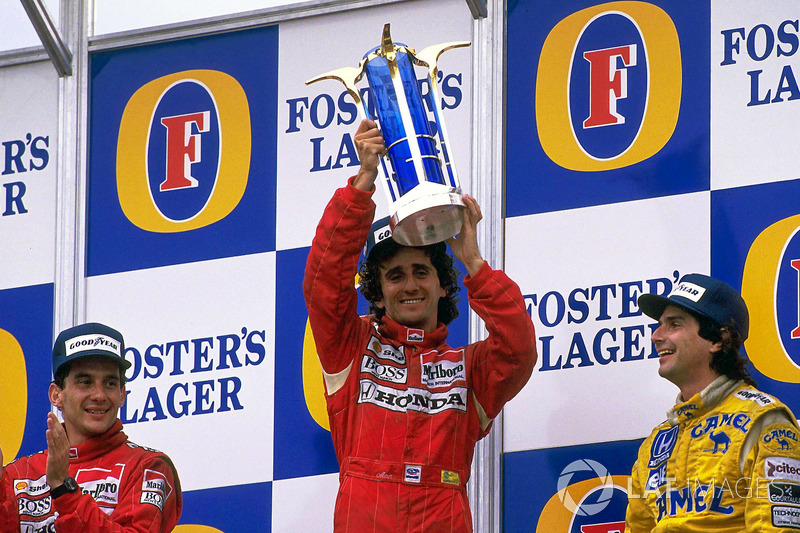 Podium : le vainqueur Alain Prost, McLaren, le deuxième Ayrton Senna, McLaren, le troisième Nelson Piquet, Lotus