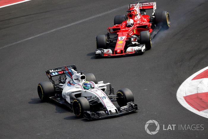 Felipe Massa, Williams FW40 y Sebastian Vettel, Ferrari SF70H battle