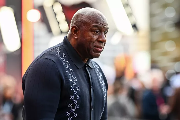 Magic Johnson arrives in the Paddock