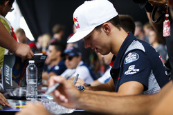 Pierre Gasly, Reserve Driver, Red Bull Racing, signs autographs for fans