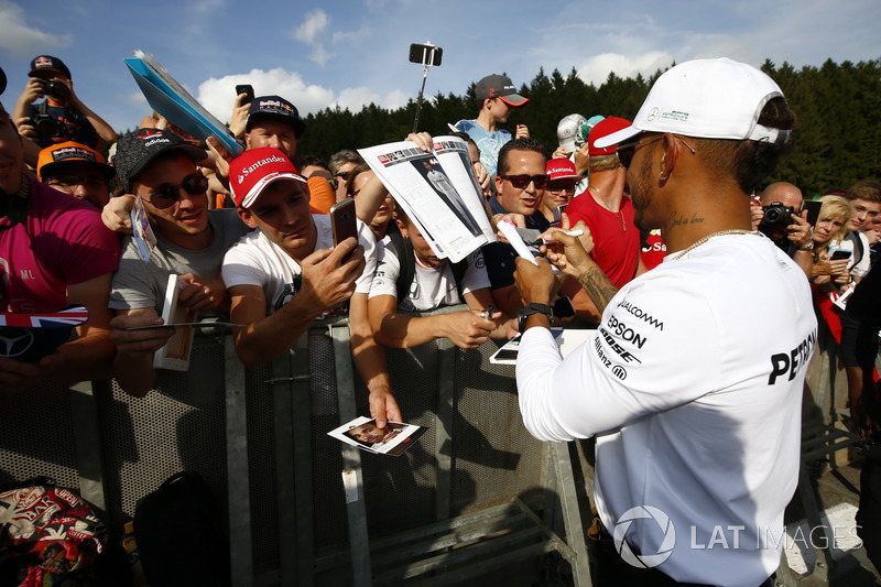 Lewis Hamilton, Mercedes AMG F1, signs autographs for fans