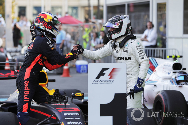 Valtteri Bottas, Mercedes AMG F1, congratulates Daniel Ricciardo, Red Bull Racing, on his victory in parc ferme