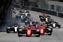 Kimi Raikkonen, Ferrari SF70-H leads Sebastian Vettel, Ferrari SF70-H at the start of the race