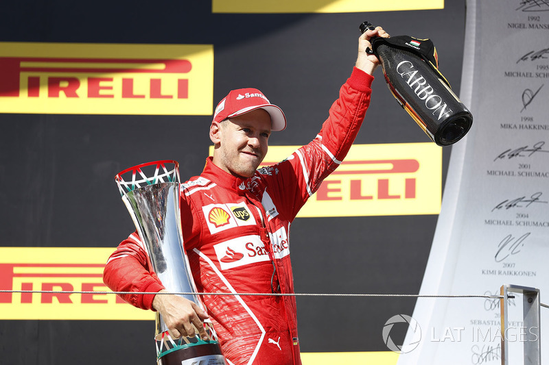 Podium: race winner Sebastian Vettel, Ferrari