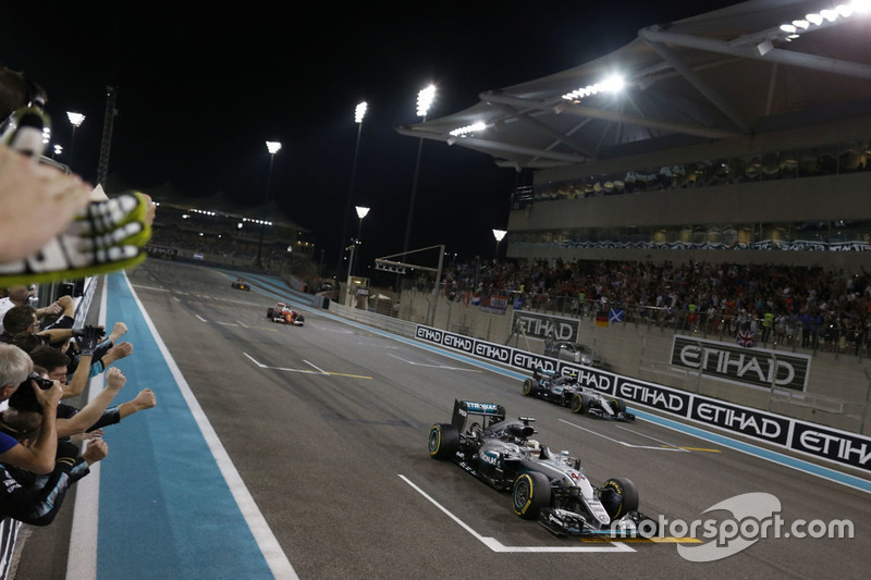 Race winner Lewis Hamilton, Mercedes AMG F1 W07 Hybrid crosses the finish line at the end of the race with second place World Champion Nico Rosberg, Mercedes AMG F1 W07 Hybrid