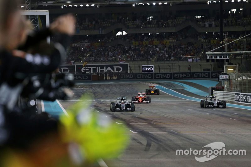 Race winner Lewis Hamilton, Mercedes AMG F1 W07 Hybrid crosses the finish line at the end of the race with second placed World Champion Nico Rosberg, Mercedes AMG F1 W07 Hybrid