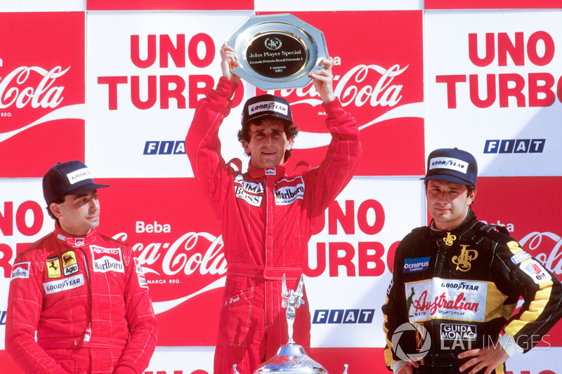 Podium: race winner Alain Prost, McLaren TAG Porsche, second place Michele Alboreto, Ferrari, third place Elio de Angelis, Lotus Renault