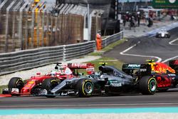 Sebastian Vettel, Ferrari SF16-H, Nico Rosberg, Mercedes AMG F1 W07 Hybrid, and Max Verstappen, Red
