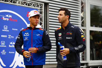 Pierre Gasly, Toro Rosso, with Daniel Ricciardo, Red Bull Racing