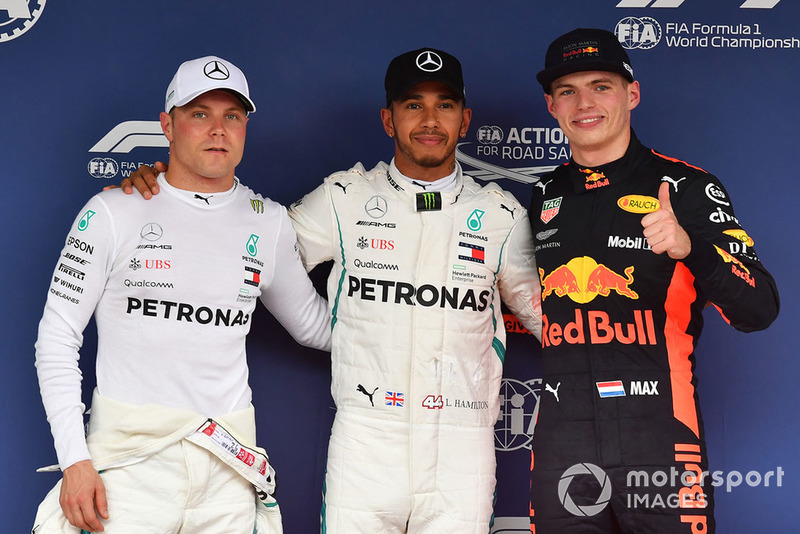 Valtteri Bottas, Mercedes AMG F1, Lewis Hamilton, Mercedes AMG F1 and Max Verstappen, Red Bull Racing celebrate in parc ferme