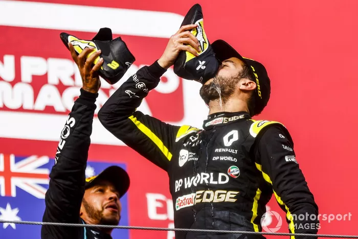 Race Winner Lewis Hamilton, Mercedes-AMG F1 and Daniel Ricciardo, Renault F1 celebrate on the podium with a shoey