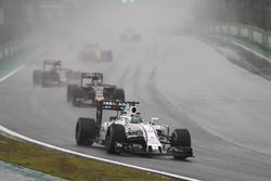 Felipe Massa, Williams FW38 Mercedes, leads Daniil Kvyat, Toro Rosso STR11, and Carlos Sainz Jr, Tor