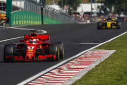 Sebastian Vettel, Ferrari SF71H, leads Nico Hulkenberg, Renault Sport F1 Team R.S. 18
