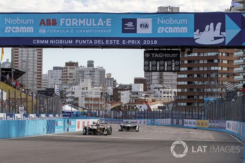 Jean-Eric Vergne, Techeetah, crosses the line, takes the chequered flag to win the race from Lucas di Grassi, Audi Sport ABT Schaeffler
