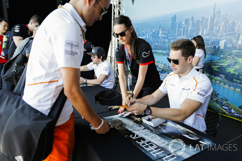 Stoffel Vandoorne, McLaren, signs autographs for fans