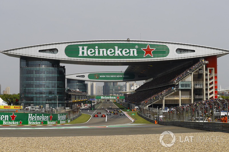 Sebastian Vettel, Ferrari SF71H, leads Kimi Raikkonen, Ferrari SF71H, Valtteri Bottas, Mercedes AMG 