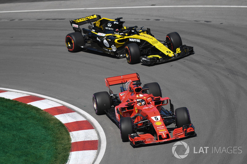 Sebastian Vettel, Ferrari SF71H and Nico Hulkenberg, Renault Sport F1 Team R.S. 18