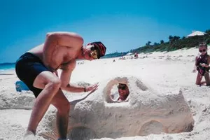 Dale Earnhardt Sr and Michael Waltrip with sand car