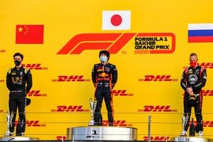 Guanyu Zhou, UNI-Virtuosi, 2nd position, Yuki Tsunoda, Carlin, 1st position, and Nikita Mazepin, Hitech Grand Prix, 3rd position, on the podium