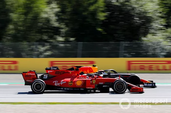 Sebastian Vettel, Ferrari SF90 y Max Verstappen, Red Bull Racing RB15 