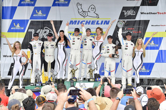 #25 BMW Team RLL BMW M8, GTLM - Alexander Sims, Connor de Phillippi, #3 Corvette Racing Chevrolet Corvette C7.R, GTLM - Antonio Garcia, Jan Magnussen, #24 BMW Team RLL BMW M8 GTLM - John Edwards, Jesse Krohn celebrate the win on the podium
