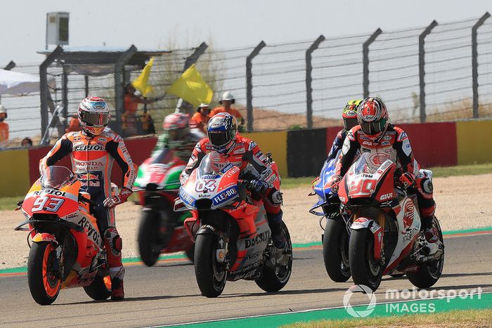 Marc Márquez, Repsol Honda Team, Andrea Dovizioso, Ducati Team, practican una arrancada