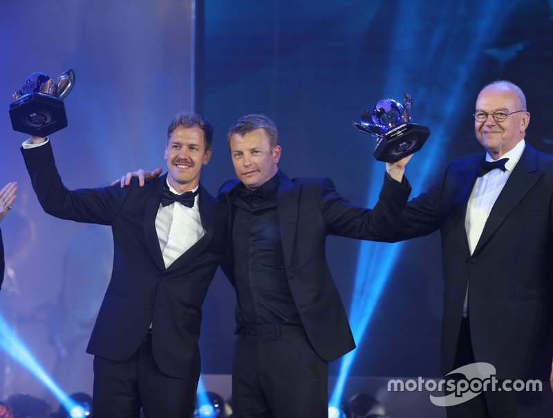 FIA Formula 1 World Championship for Drivers: Sebastian Vettel and Kimi Räikkönen with their runner up trophies