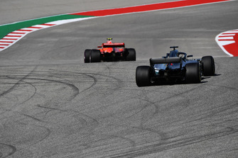 Kimi Raikkonen, Ferrari SF71H leads Lewis Hamilton, Mercedes AMG F1 W09 EQ Power+