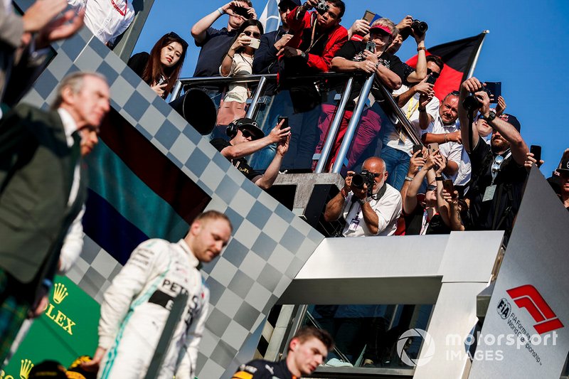 Valtteri Bottas, Mercedes AMG F1, 1st position, and Max Verstappen, Red Bull Racing, 3rd position, on the podium