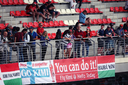 Kimi Raikkonen, Ferrari fans and banners