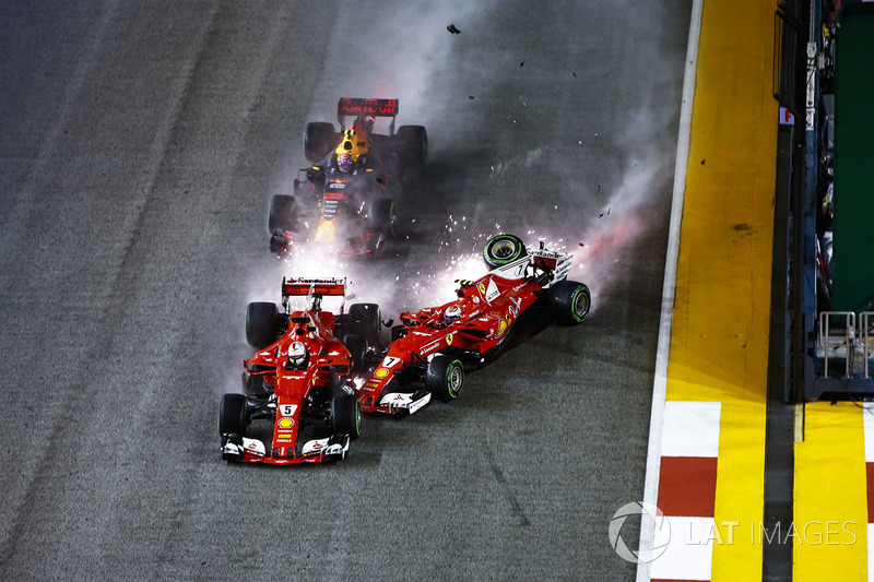 Sparks fly as Kimi Raikkonen, Ferrari SF70H hits Max Verstappen, Red Bull Racing RB13 and Sebastian Vettel, Ferrari SF70H