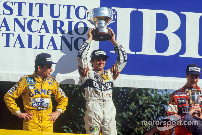 Podium: race winner Nelson Piquet, Williams, second place Ayrton Senna, Team Lotus, third place Nige