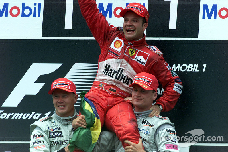 Podium: Race winner Rubens Barrichello, Ferrari, second place Mika Hakkinen, McLaren Mercedes, third