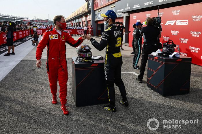 Sebastian Vettel, Ferrari, y Daniel Ricciardo, Renault F1