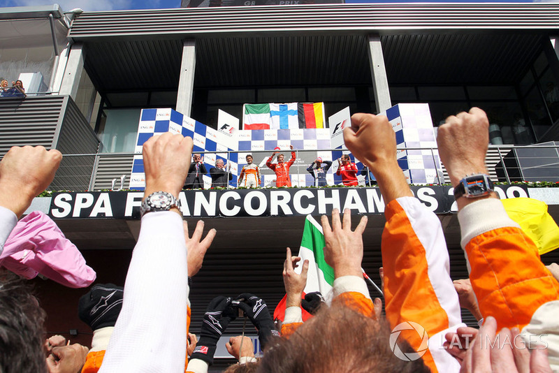 The podium: Giancarlo Fisichella, Force India F1, second; Kimi Raikkonen, Ferrari, race winner; Sebastian Vettel, Red Bull Racing, third