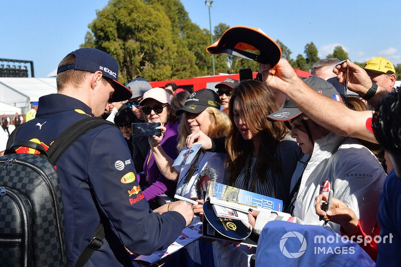 Max Verstappen, Red Bull Racing, signs autographs for fans
