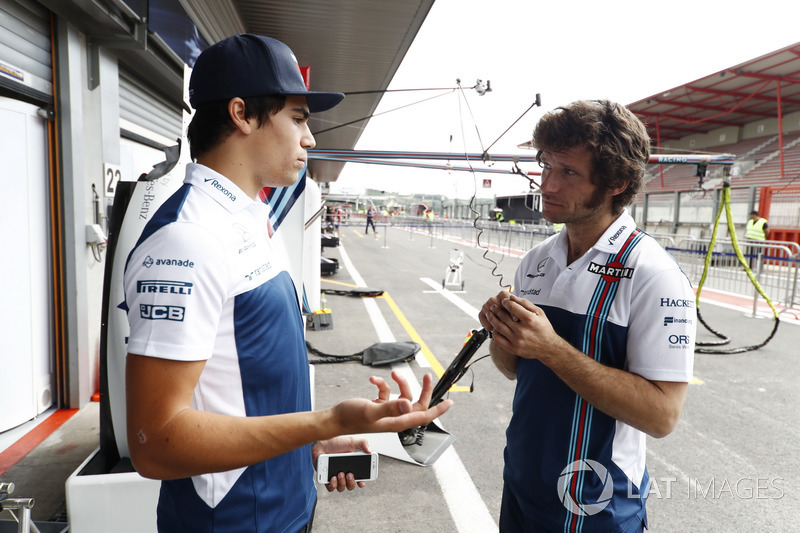 Lance Stroll, Williams, talks to motorcycle racer and TV presenter Guy Martin