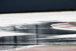 The soaked circuit after being doused by tankers during the lunch break