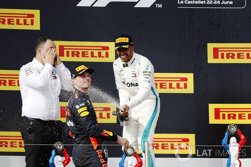Ron Meadows, Sporting Director, Mercedes AMG, Max Verstappen, Red Bull Racing, and Lewis Hamilton, Mercedes AMG F1, spray the champagne on the podium