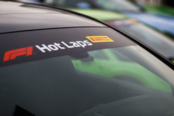 A Mercedes, McLaren and Aston Martin line-up ahead of participating in Pirelli Hot Laps