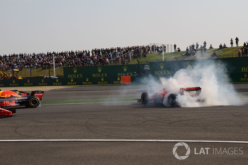 Max Verstappen, Red Bull Racing RB14 and Sebastian Vettel, Ferrari SF71H clash