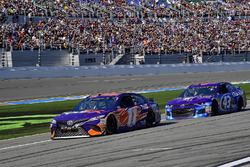 Denny Hamlin, Joe Gibbs Racing Toyota and Darrell Wallace Jr., Richard Petty Motorsports Ford Fusion on pit road
