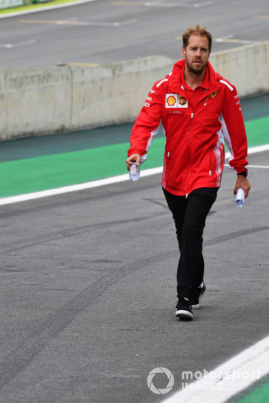 Sebastian Vettel, Ferrari walks the track 