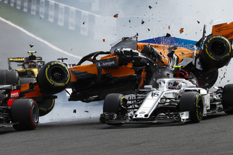 Charles Leclerc, Sauber C37, Fernando Alonso, McLaren MCL33 collide at the start of the race