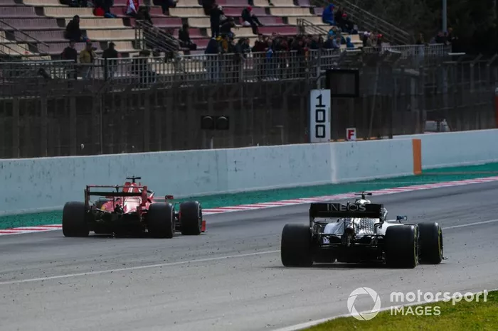 Charles Leclerc, Ferrari SF1000, passes Valtteri Bottas, Mercedes F1 W11
